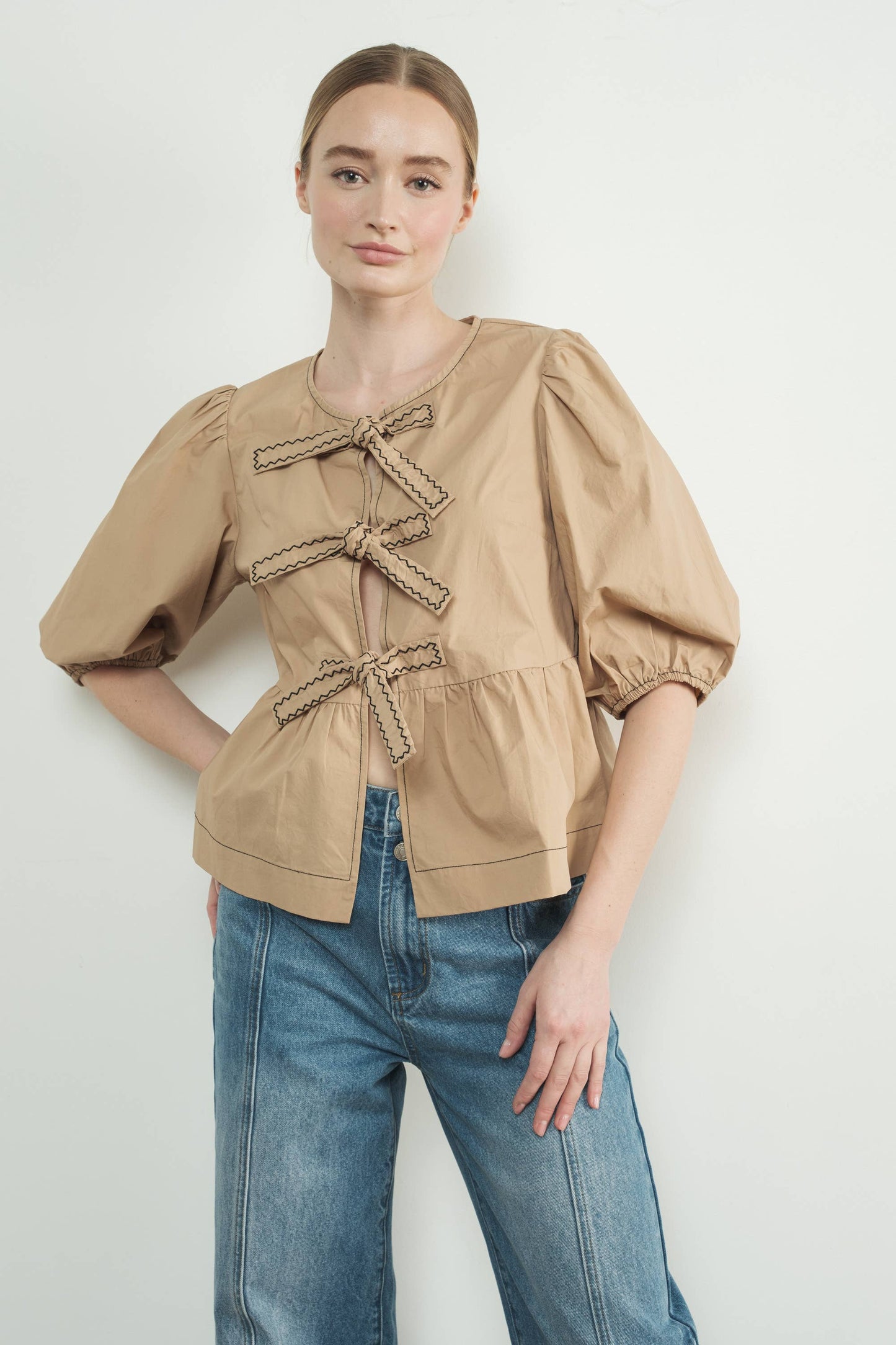 MAT3114 EMBROIDERED BOW TIE PEPLUM BLOUSE