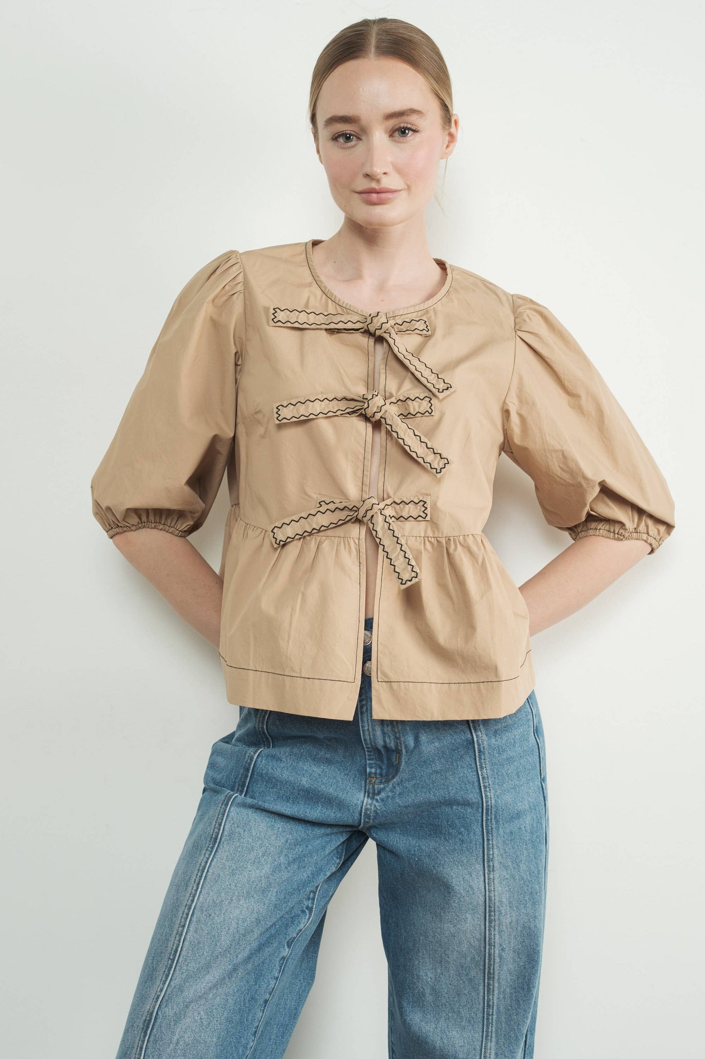 MAT3114 EMBROIDERED BOW TIE PEPLUM BLOUSE
