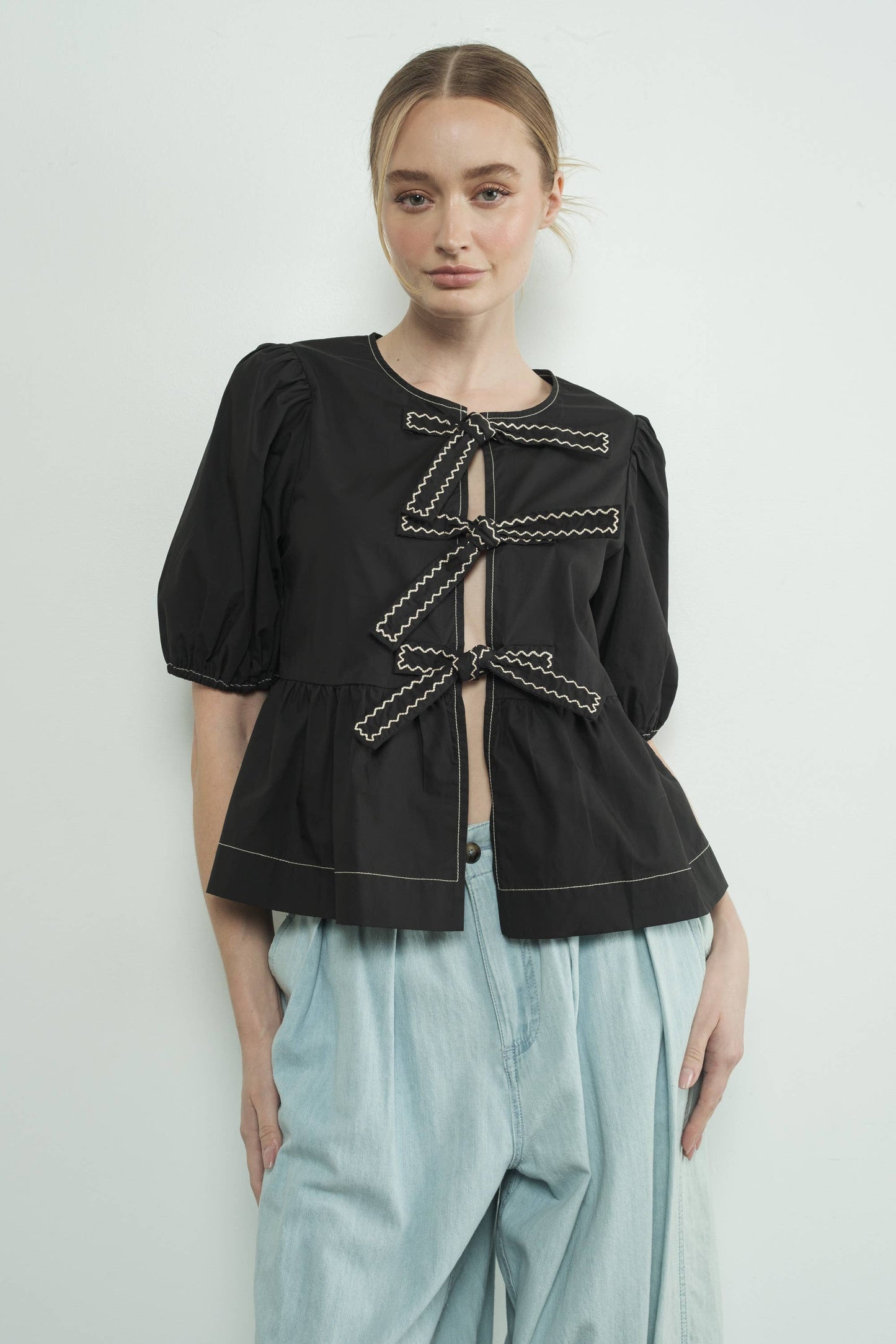 MAT3114 EMBROIDERED BOW TIE PEPLUM BLOUSE