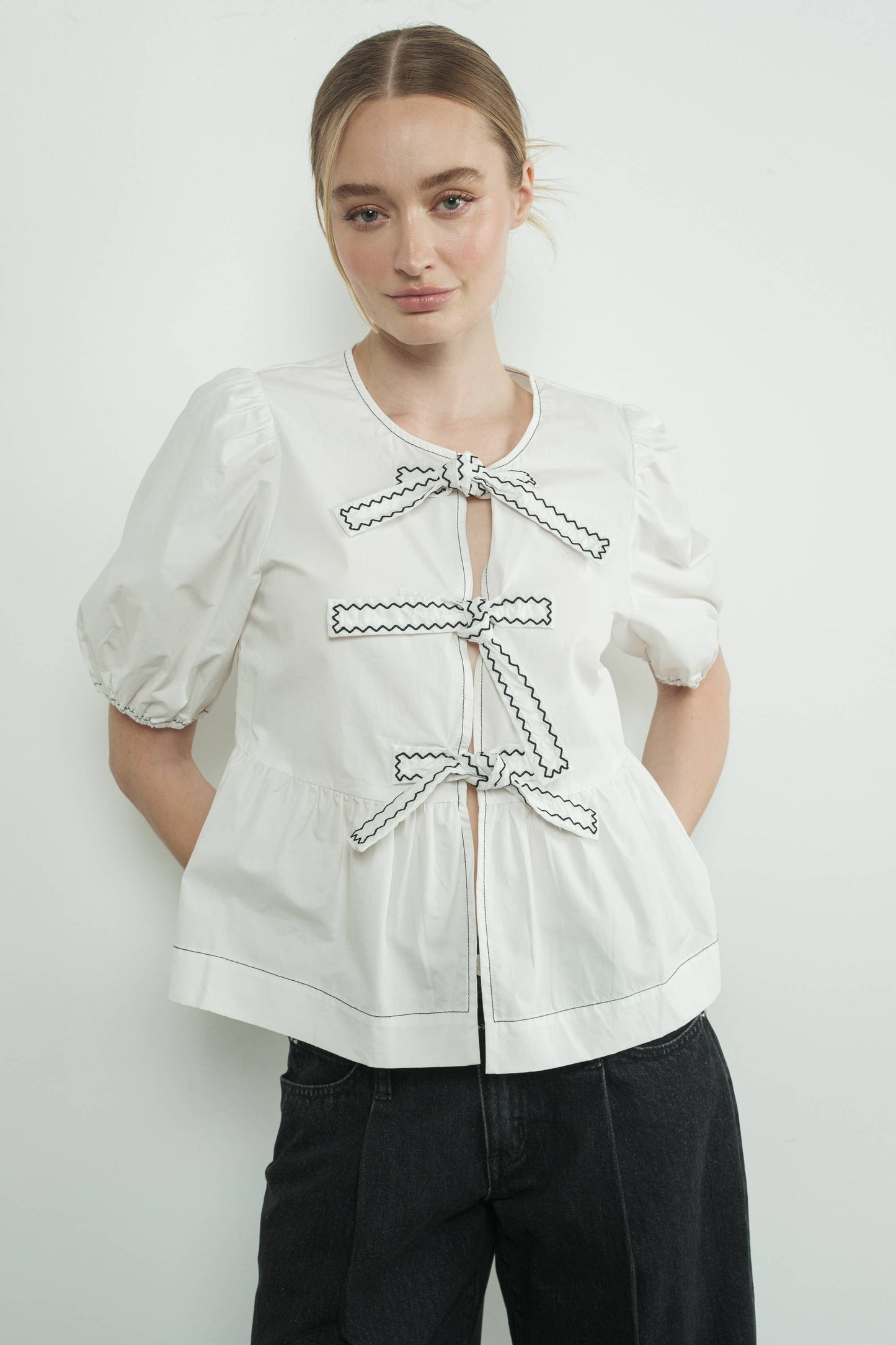 MAT3114 EMBROIDERED BOW TIE PEPLUM BLOUSE