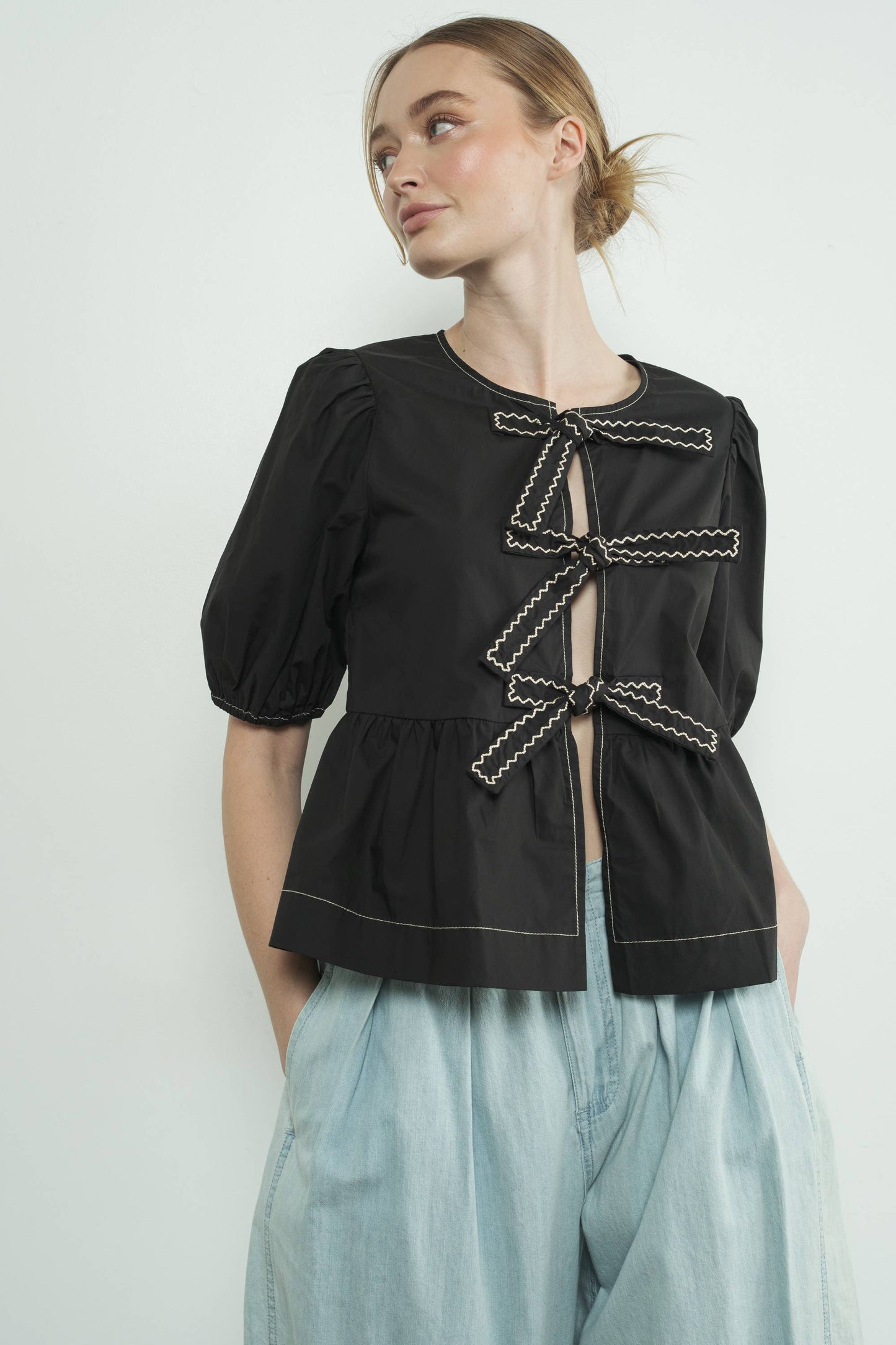 MAT3114 EMBROIDERED BOW TIE PEPLUM BLOUSE