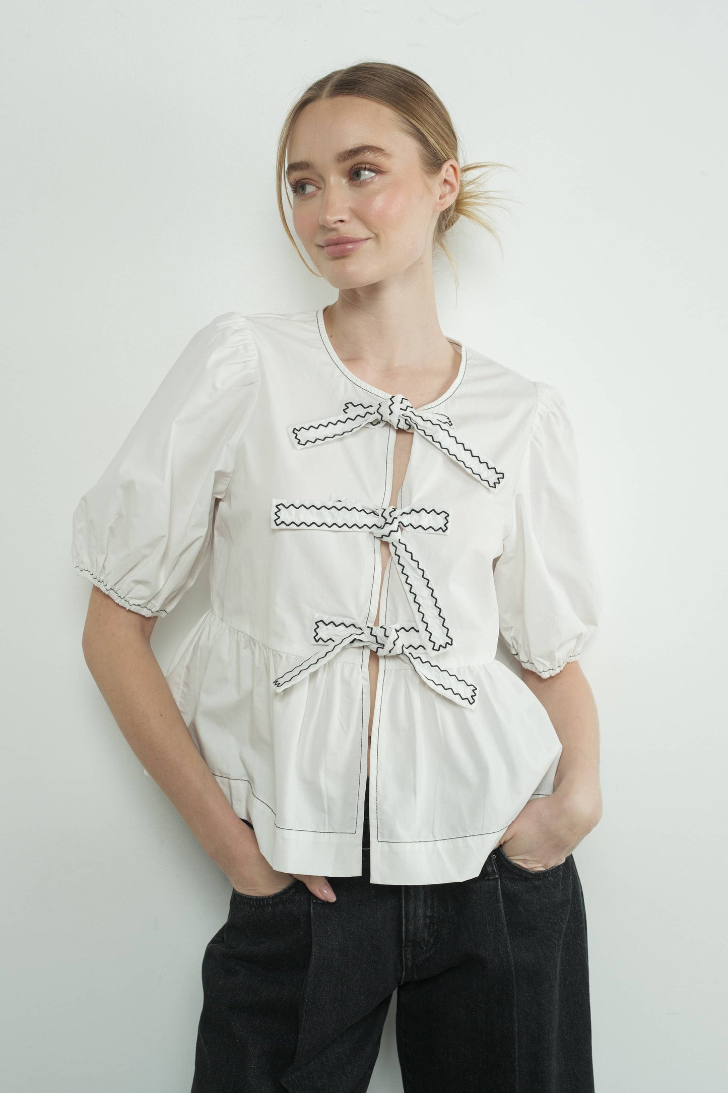 MAT3114 EMBROIDERED BOW TIE PEPLUM BLOUSE