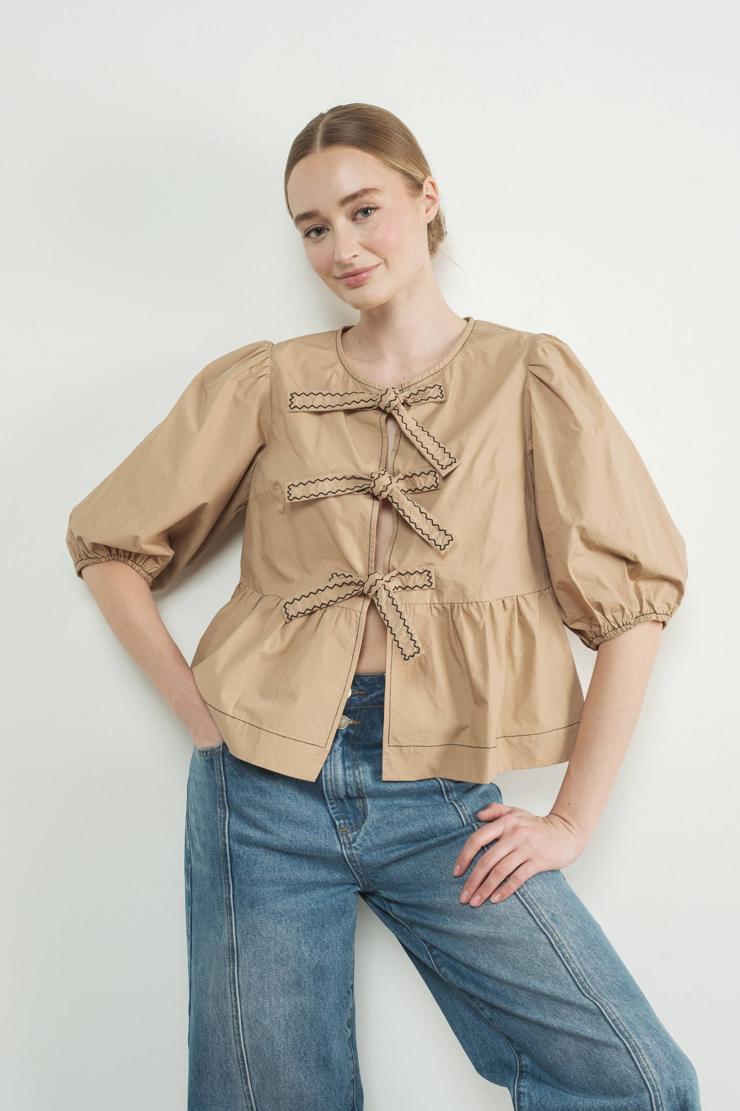 MAT3114 EMBROIDERED BOW TIE PEPLUM BLOUSE