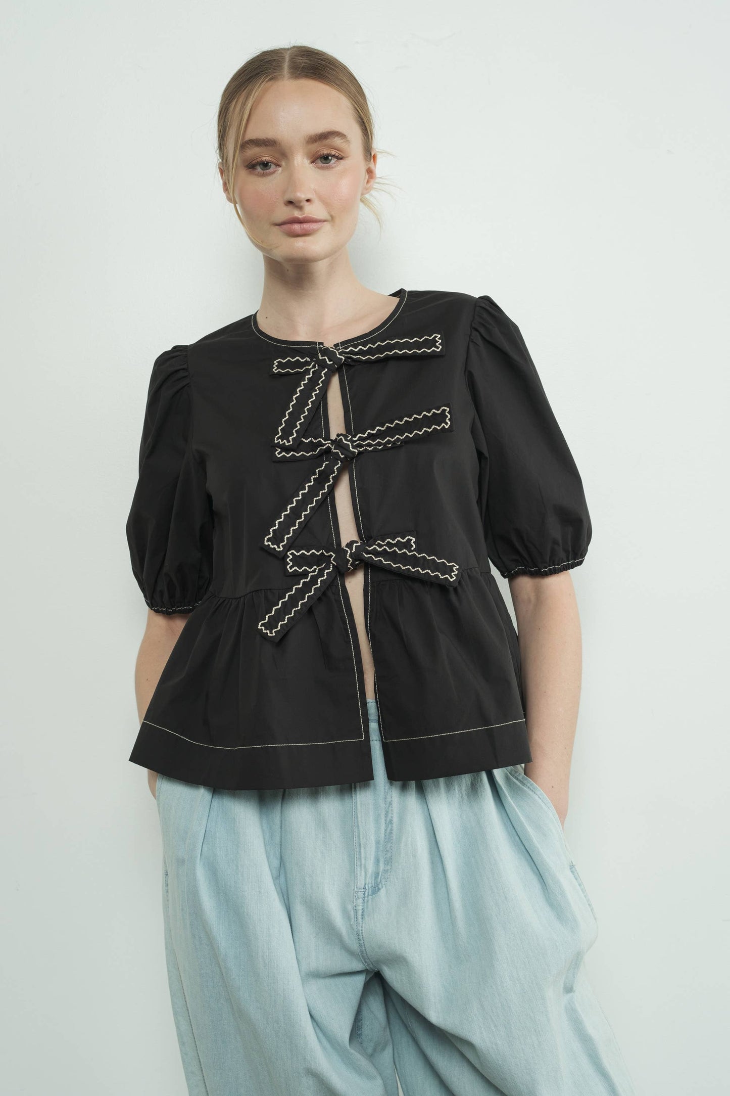 MAT3114 EMBROIDERED BOW TIE PEPLUM BLOUSE