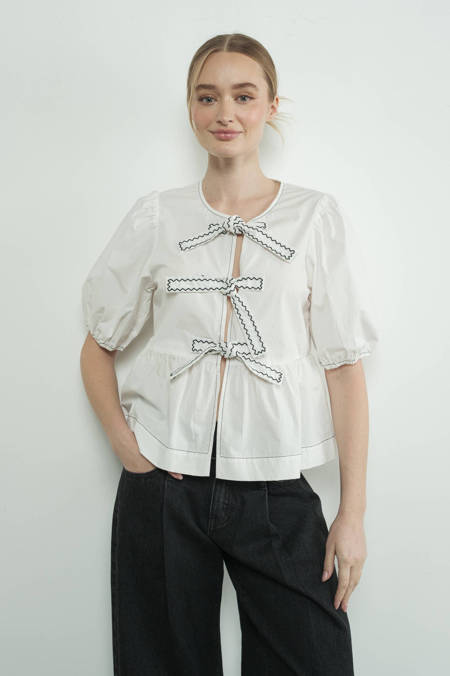 MAT3114 EMBROIDERED BOW TIE PEPLUM BLOUSE